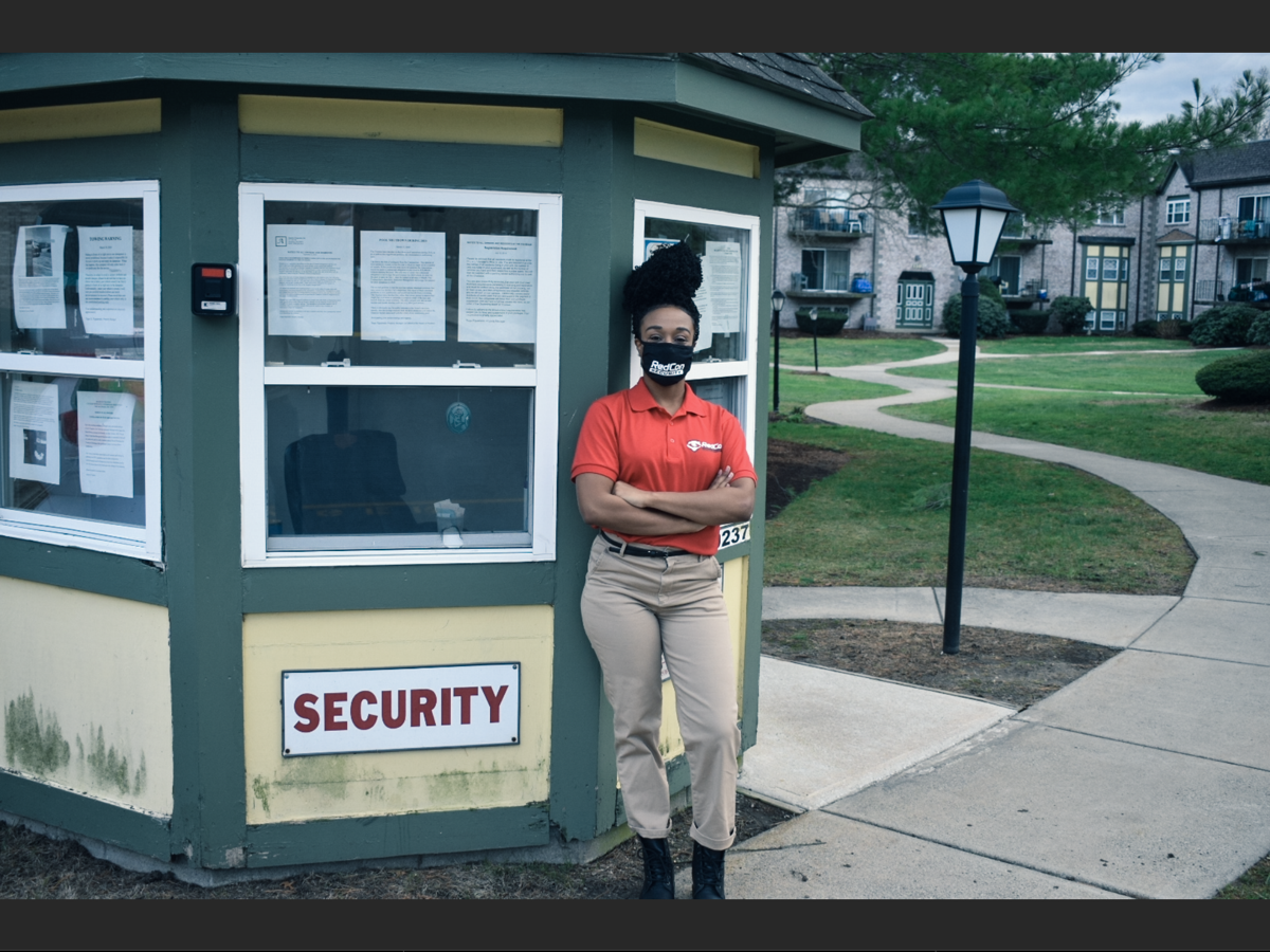 Concierge security staff member stationed at a property gatehouse